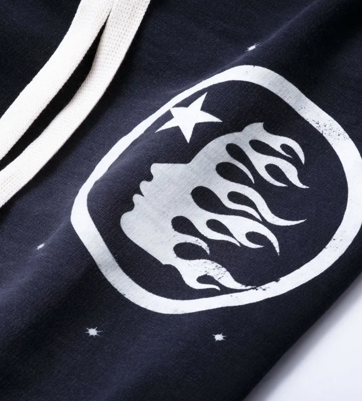 Hellstar Studios Capsule 9.0 ‘Racer Black Flare’ Sweatpants Black, Corner Logo View