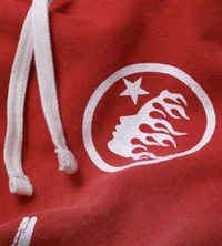 Hellstar Studios Capsule 9.0 ‘Racer Red Flare’ Red Sweatpants, Front Corner Logo View