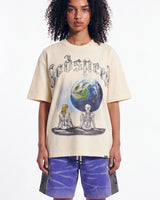 Godspeed Artificial Love II NG Tee bone, upper body front view on model showing the two robots and Earth graphic