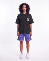 Godspeed Halftime Shorts V2 Blue Acid Wash, worn by a model, full-length view