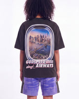 Godspeed GS Air NYC Pocket Tee black, upper body rear view on model showing the Manhattan skyline window print