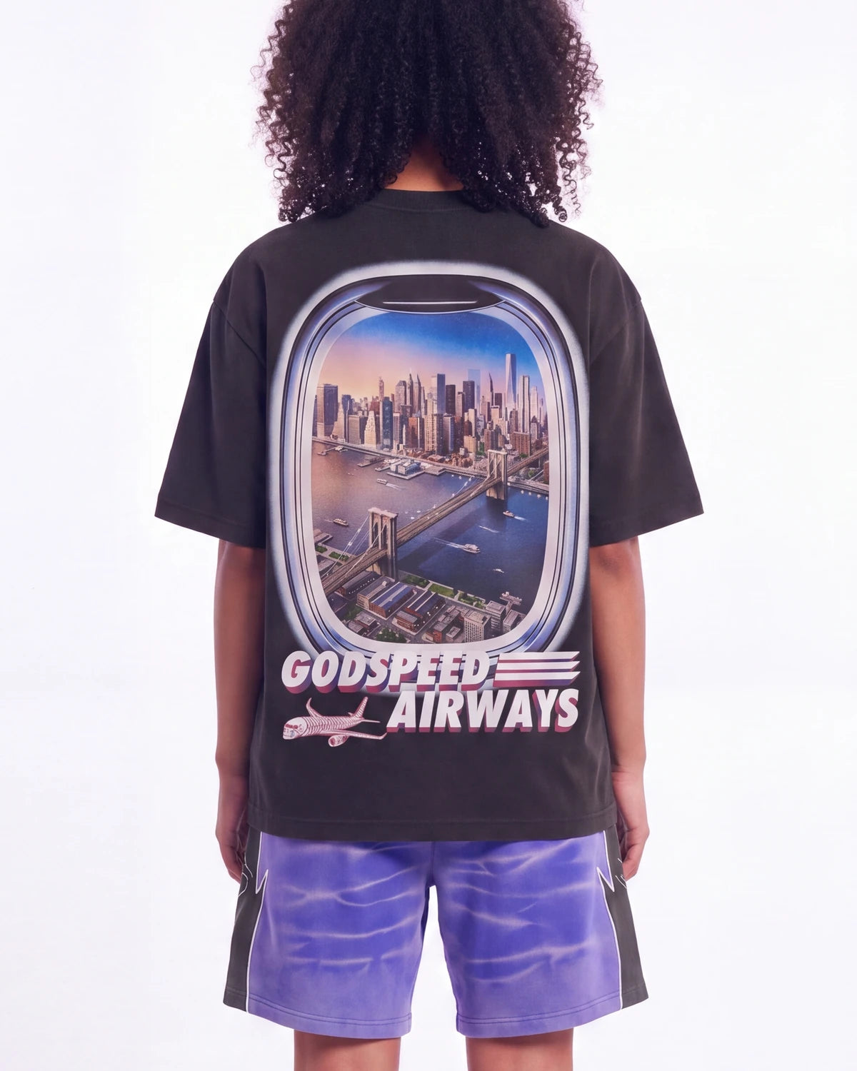 Godspeed GS Air NYC Pocket Tee black, upper body rear view on model showing the Manhattan skyline window print