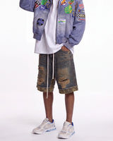 Vale Forever Double Jorts blue, waist-down front view on model showing the destroyed double-layer denim