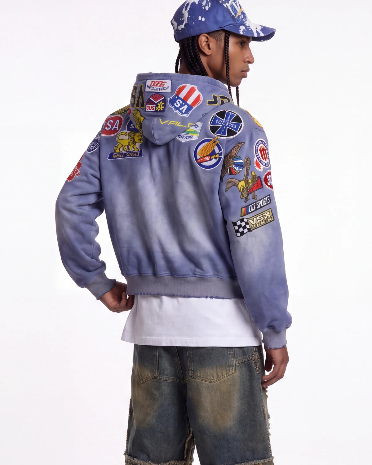 Vale Forever Passport Zip Up Denim Jacket blue, upper body rear view on model showing the patched shoulders and hood