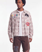 Vale Forever VSU 2000 Flannel brown, upper body front view on model showing the plaid and patchwork graphics