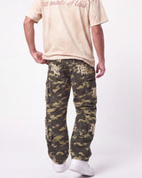 Mixed Emotions ME Camo Cargo Pants green camo, waist-down rear view on model showing the ME patch pockets