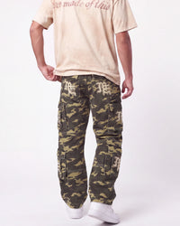 Mixed Emotions ME Camo Cargo Pants green camo, waist-down rear view on model showing the ME patch pockets