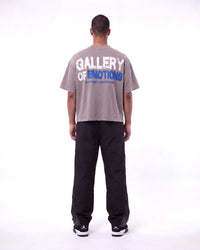 Mixed Emotions Gallery Tee grey, full rear view on model showing the GALLERY OF EMOTIONS back print