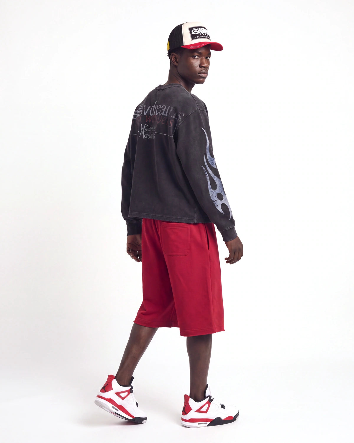 Vale Forever Psychopath L/S Tee black, full rear view on model worn with red uniform shorts