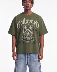 Godspeed Collegiate Tee Olive Wash, cropped on-model front view showing the crest graphic and boxy fit