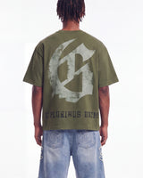 Godspeed Collegiate Tee Olive Wash, cropped on-model back view showing the gothic G monogram