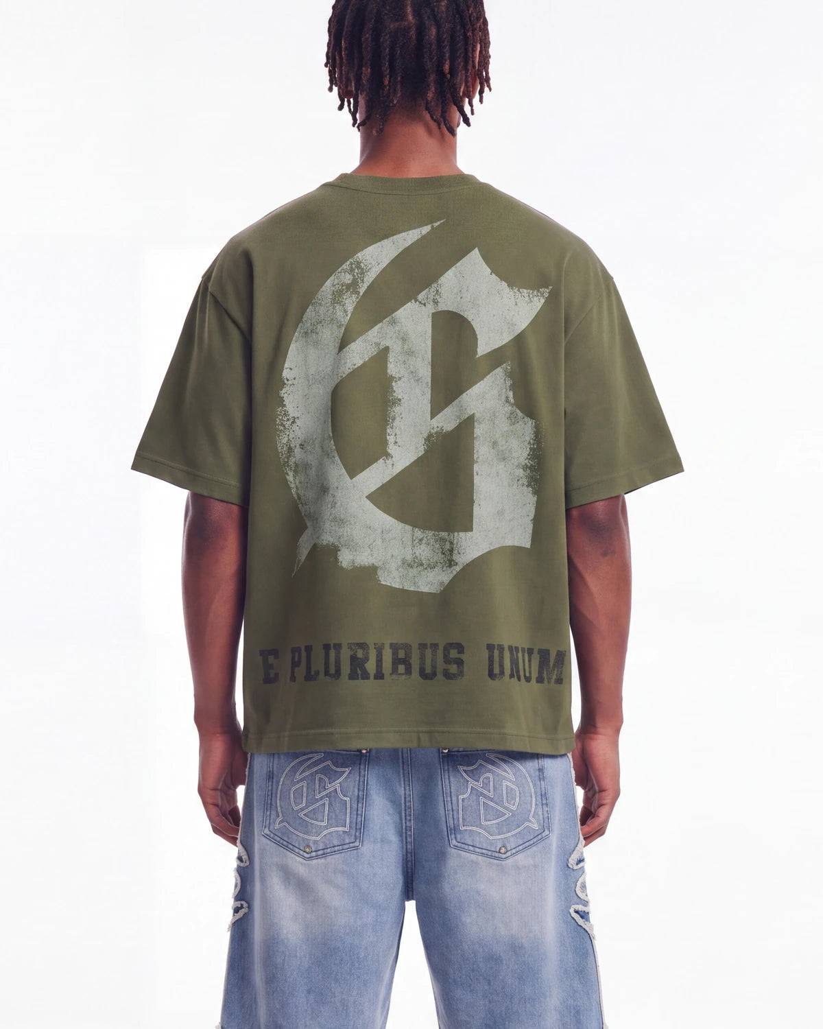 Godspeed Collegiate Tee Olive Wash, cropped on-model back view showing the gothic G monogram