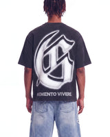 Godspeed Silencio Tee Black Wash, cropped on-model back view showing the G monogram
