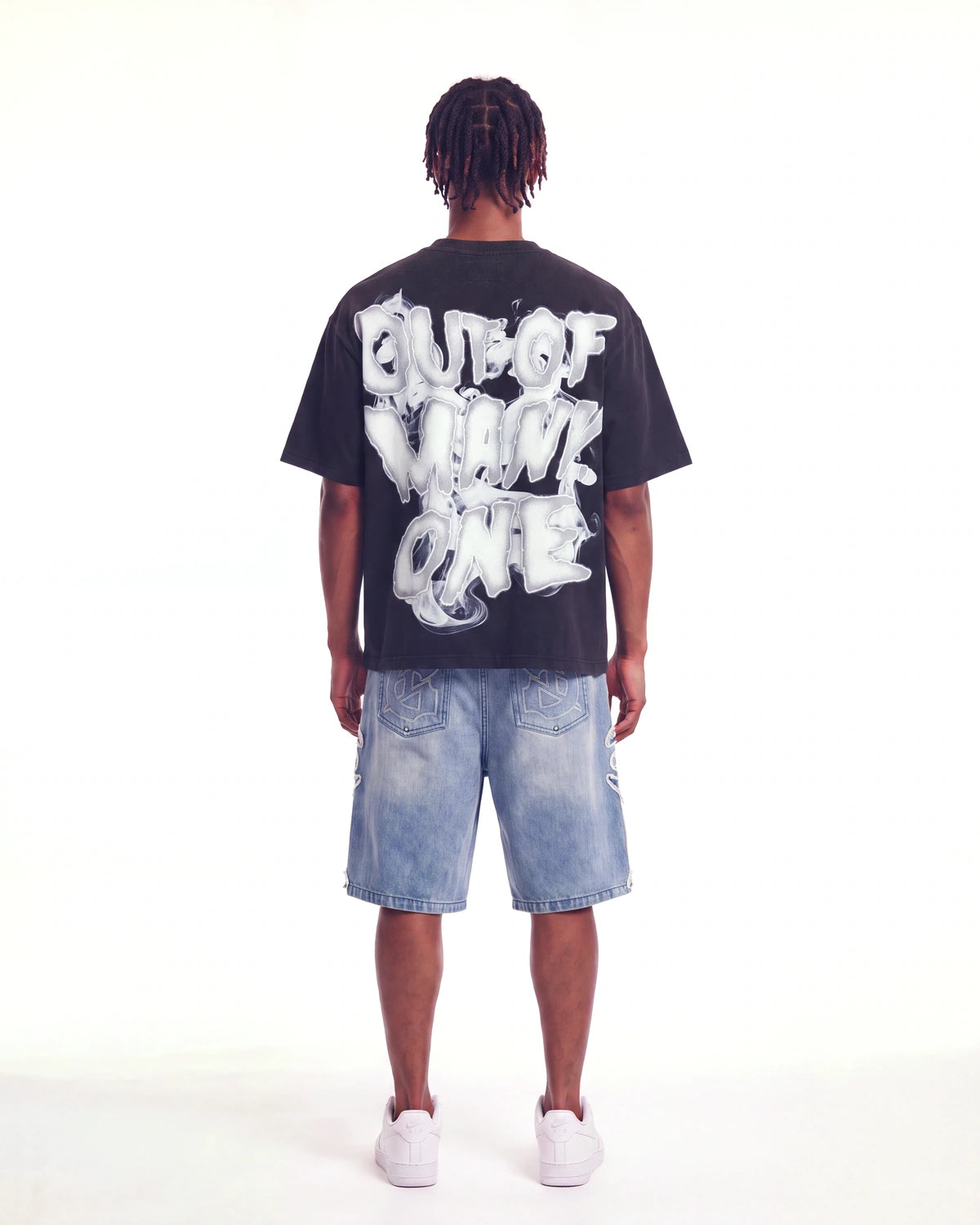 Godspeed No Risk No Reward Tee Black Wash, worn by a model, full-length back view showing the bubble lettering