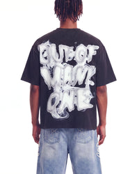 Godspeed No Risk No Reward Tee Black Wash, cropped on-model back view showing the bubble lettering