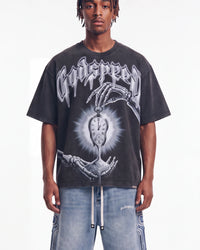 Godspeed Borrowed Time Tee Black Wash, cropped on-model front view showing the pocket watch graphic and boxy fit