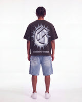 Godspeed Borrowed Time Tee Black Wash, worn by a model, full-length back view showing the G monogram print