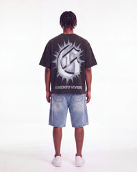 Godspeed Borrowed Time Tee Black Wash, worn by a model, full-length back view showing the G monogram print