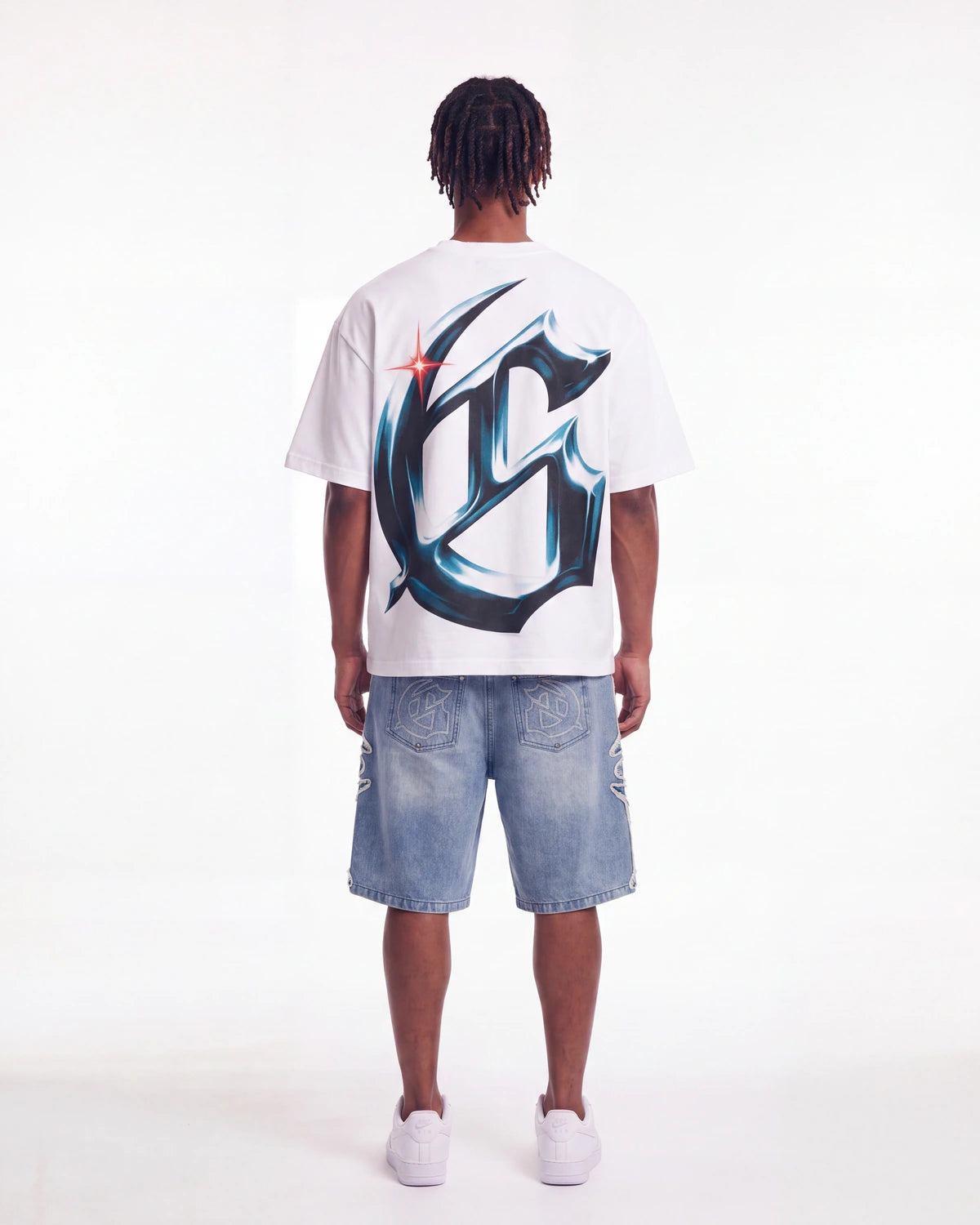 Godspeed New Age Reloaded Tee White, worn by a model, full-length back view showing the chrome G monogram