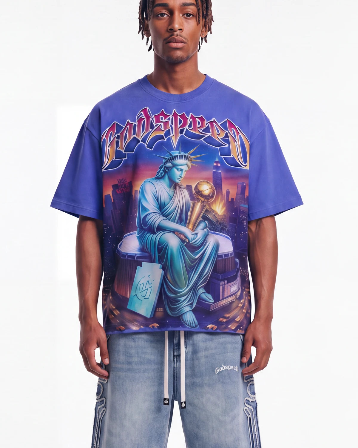 Godspeed Finally Tee blue, upper body front view on model showing the Statue of Liberty and gold trophy graphic