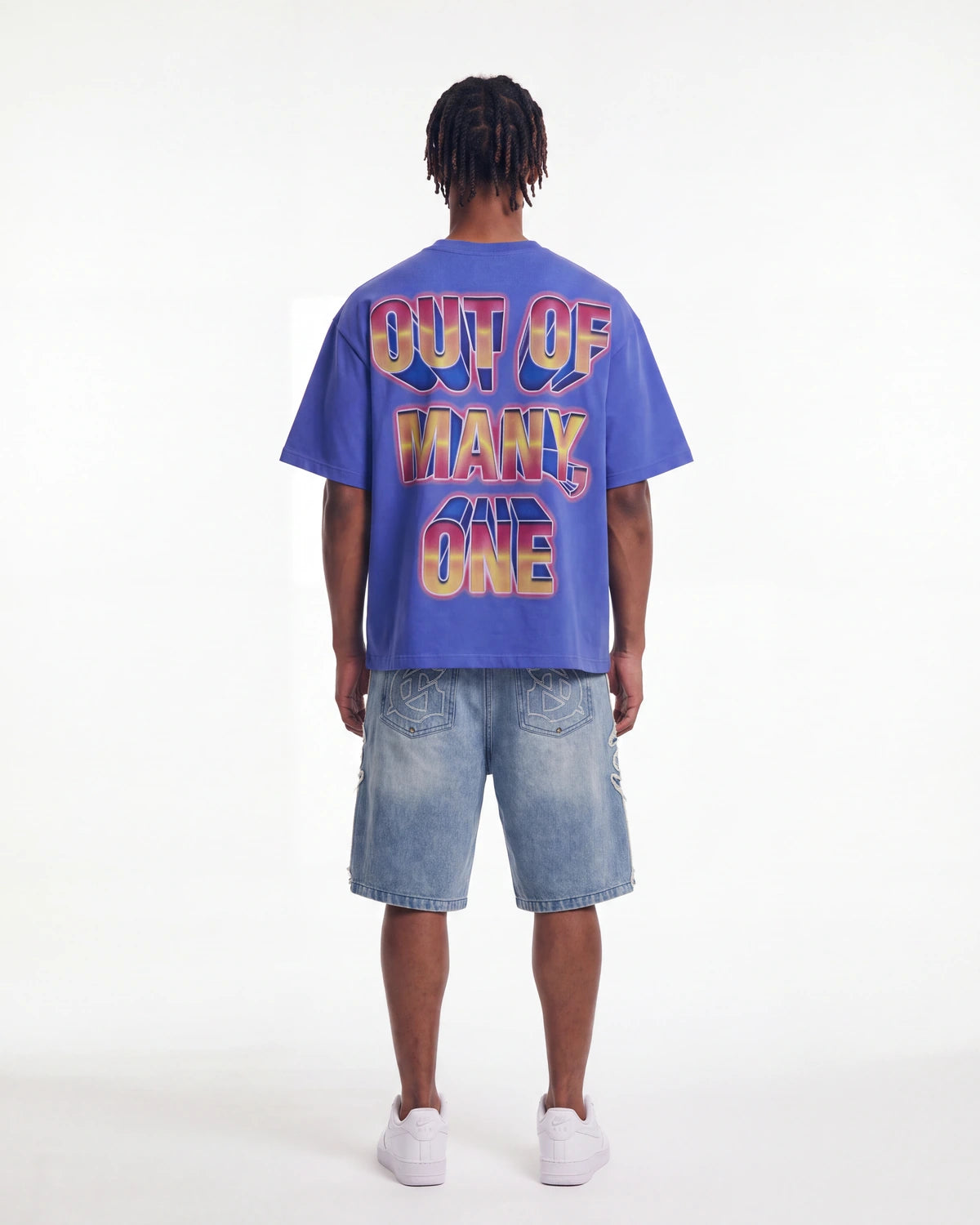 Godspeed Finally Tee blue, full rear view on model showing the OUT OF MANY, ONE block lettering