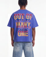 Godspeed Finally Tee blue, upper body rear view on model showing the OUT OF MANY, ONE block lettering