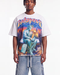 Godspeed Finally Tee white, upper body front view on model showing the Statue of Liberty and gold trophy graphic