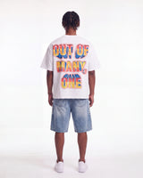 Godspeed Finally Tee white, full rear view on model showing the OUT OF MANY, ONE block lettering