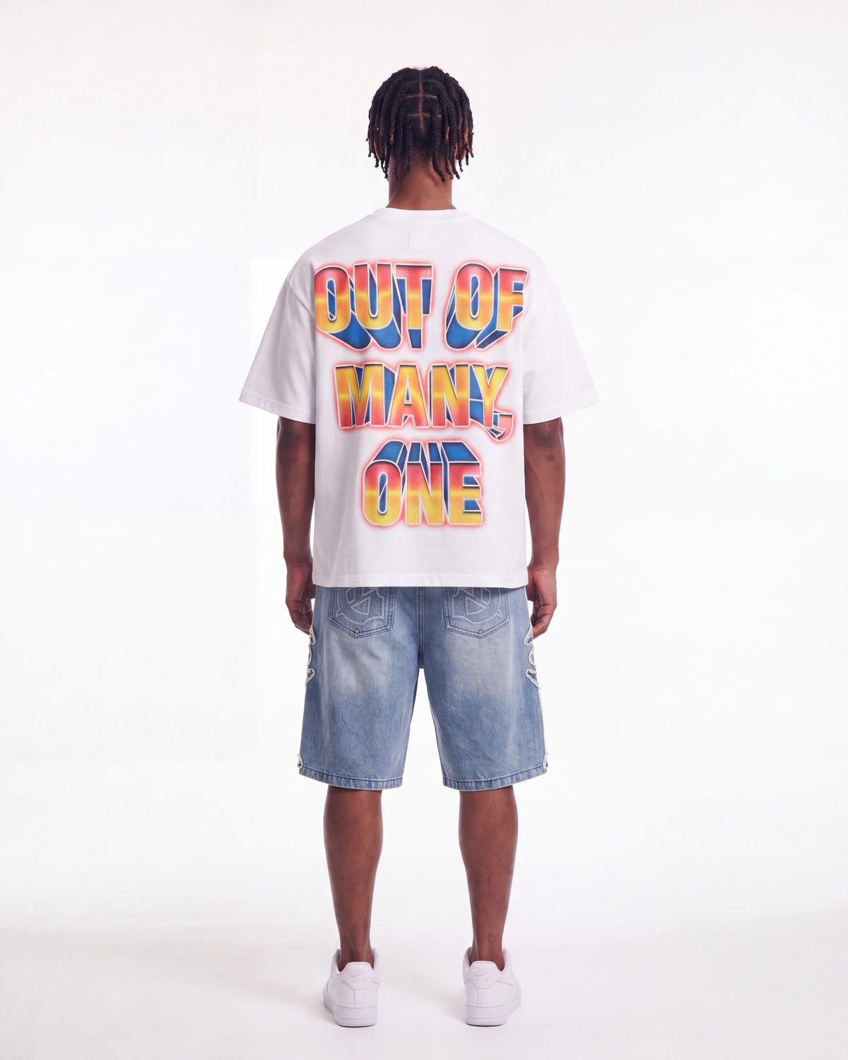 Godspeed Finally Tee white, full rear view on model showing the OUT OF MANY, ONE block lettering