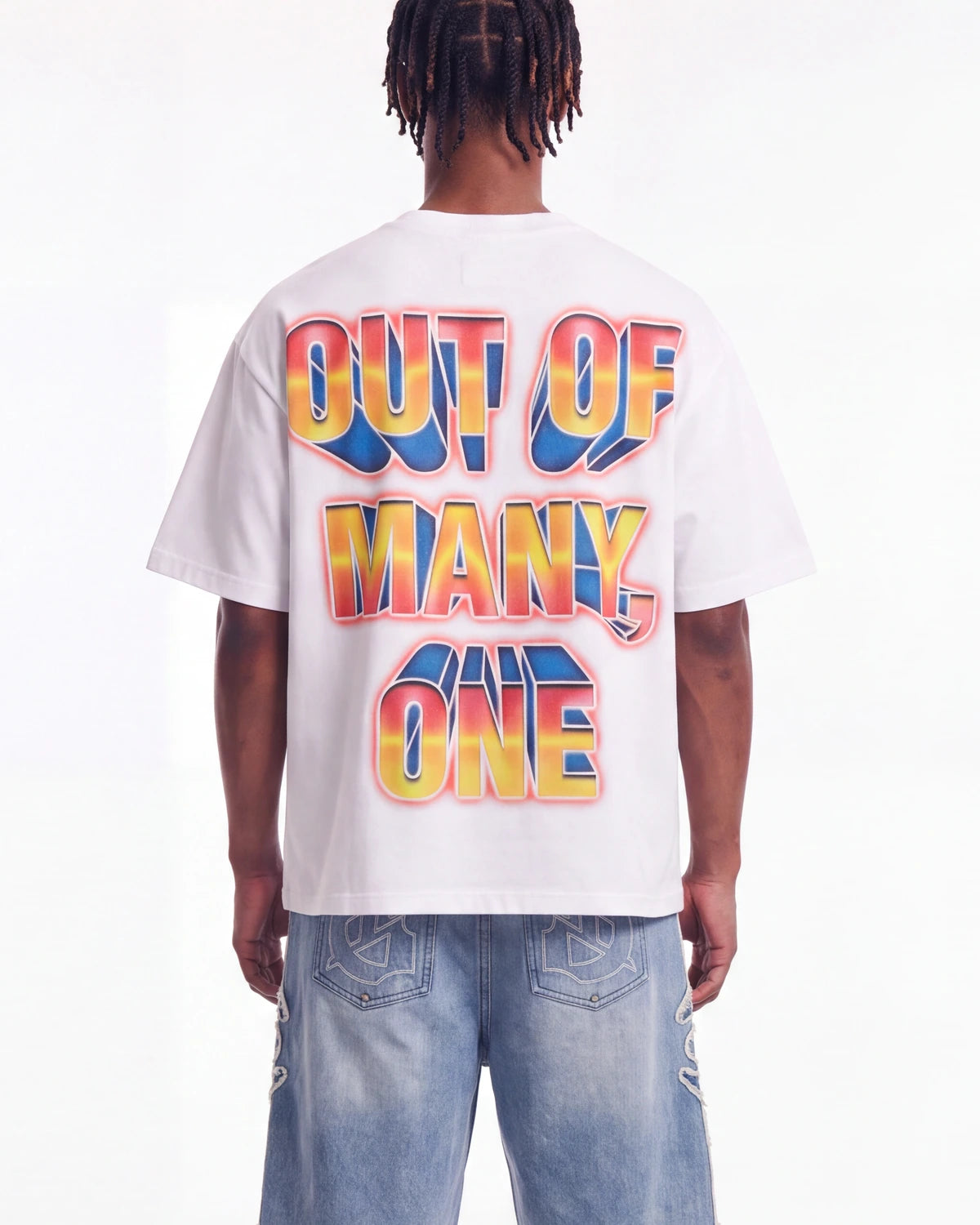 Godspeed Finally Tee white, upper body rear view on model showing the OUT OF MANY, ONE block lettering