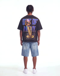 Godspeed Liberty Reigns Tee black, full rear view on model showing the gold trophy and OUT OF MANY, ONE lettering