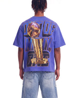 Godspeed Liberty Reigns Tee blue, upper body rear view on model showing the gold trophy back print