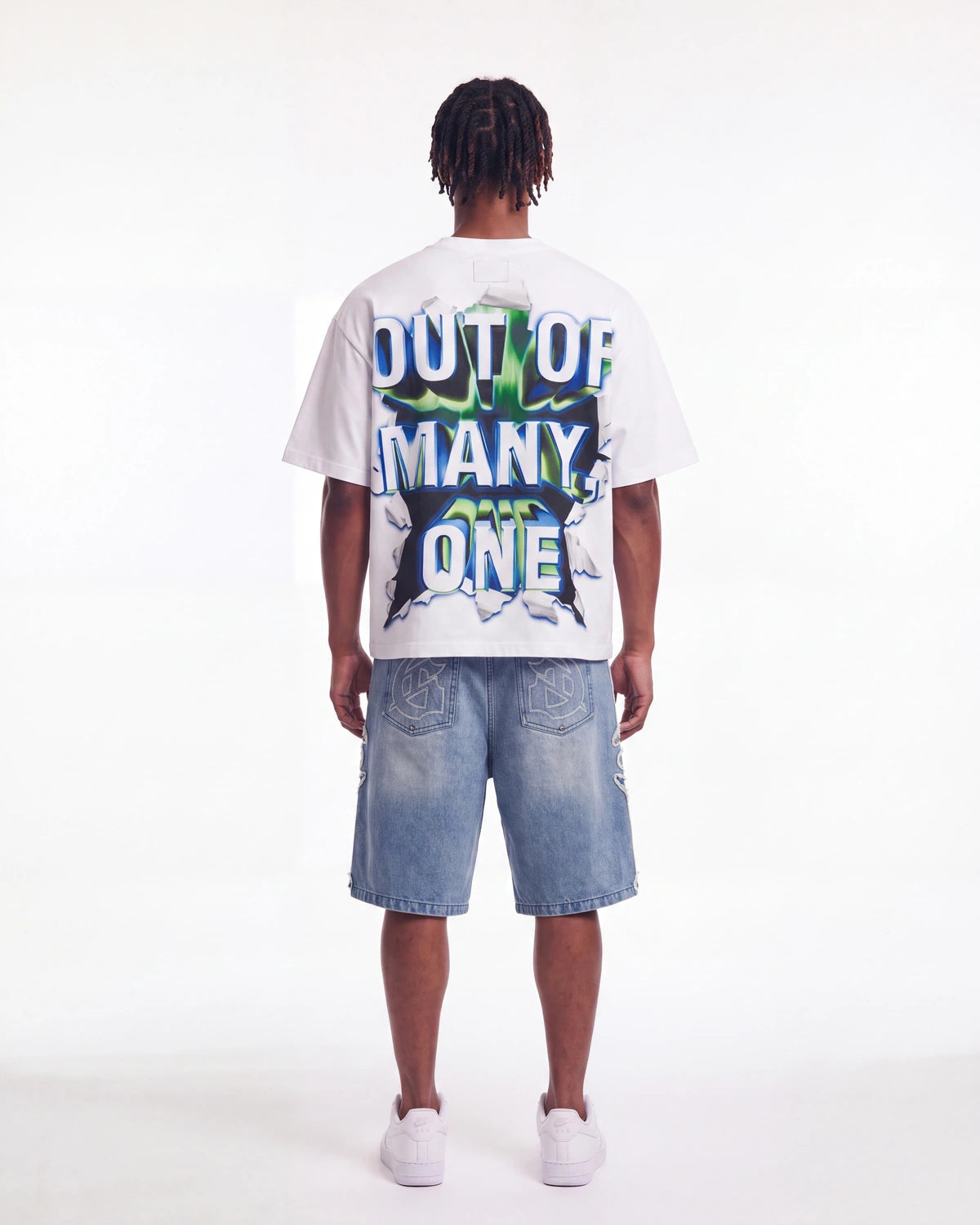 Godspeed Neighborhood Watch Tee white, full rear view on model showing the OUT OF MANY, ONE torn-fabric back print