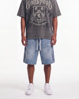 Godspeed Femur Frayed Denim Shorts Blue, worn on-model view showing the fit through the leg