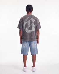 Godspeed Collegiate Tee Grey Wash, worn by a model showing the gothic G monogram back print, full back view