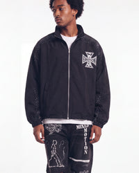 Mixed Emotions Classic Nylon Jacket black, upper body front view on model showing the Iron Cross chest logo