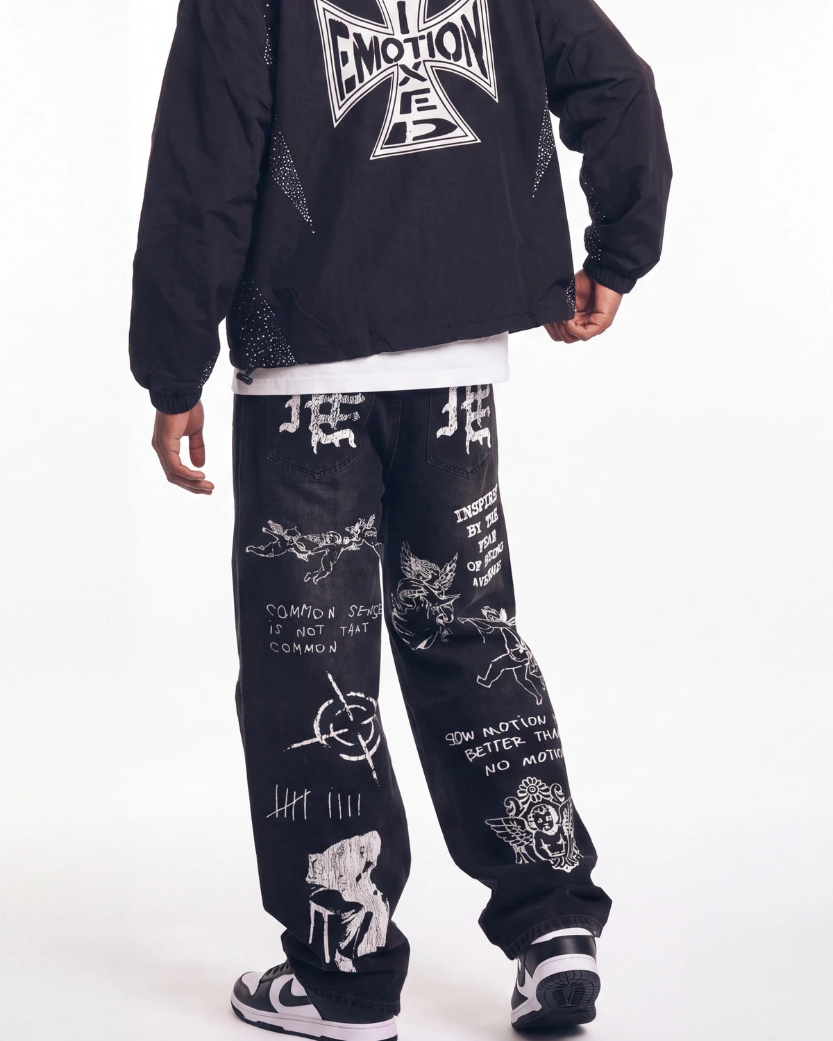 Mixed Emotions Canvas Denim black, waist-down rear view on model showing the Old English ME letters