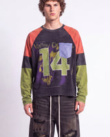 Vale Forever Boomerang L/S Tee black, upper body front view on model showing the appliqué 14 and colorblock sleeves