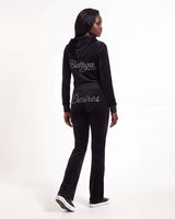 model wearing bottega desires black velour sweatsuit