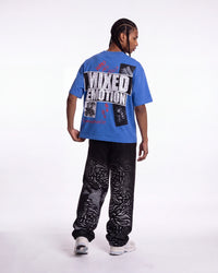 Mixed Emotions Striped Sweatpants black, full rear view on model worn with a blue graphic tee