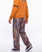 HMDD Chim Tree H-Star Nylon Pants camo, waist-down rear view on model showing the camo print
