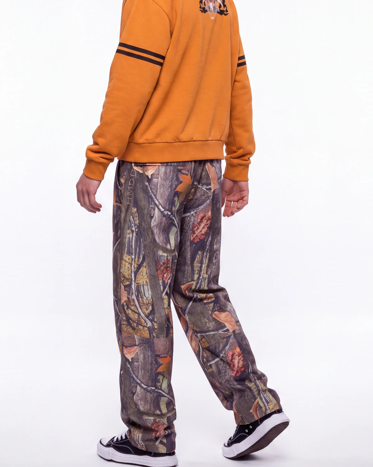 HMDD Chim Tree H-Star Nylon Pants camo, waist-down rear view on model showing the camo print