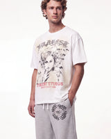 Bravest Studios Vivian Tee white, upper body front view on model showing the sketched portrait graphic