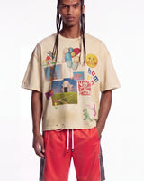 All Human Requiem For A Dream Tee cream, upper body front view on model showing the balloon and smiling sun collage