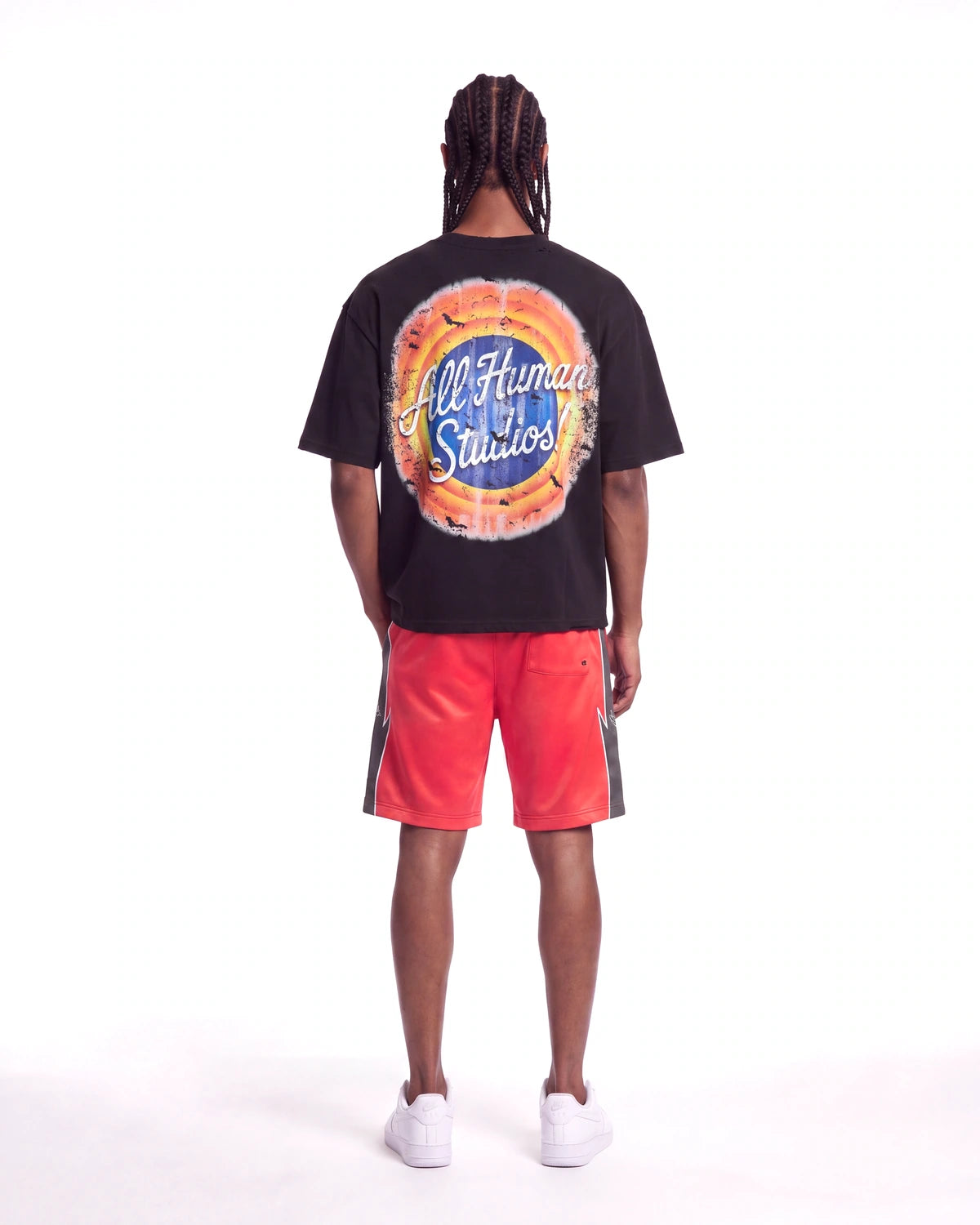 All Human Like Mike Tee black, full rear view on model showing the All Human Studios sunburst roundel