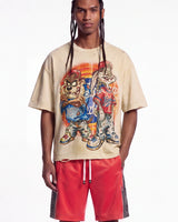 All Human Lefrak Tee cream, upper body front view on model showing the airbrushed cartoon baseball graphic