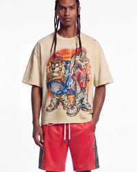 All Human Lefrak Tee cream, upper body front view on model showing the airbrushed cartoon baseball graphic