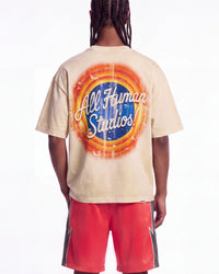 All Human Lefrak Tee cream, upper body rear view on model showing the All Human Studios roundel