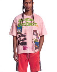 All Human Champagne Room Tee pink, upper body front view on model showing the green graffiti and photo collage
