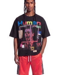 All Human BSOD Tee black, upper body front view on model showing the rainbow-glitch Human and desktop-window collage